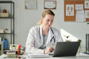 Healthcare professional reviewing patient records for Outsource Revenue Cycle Management NJ.